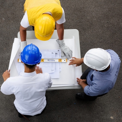 construction workers around a table