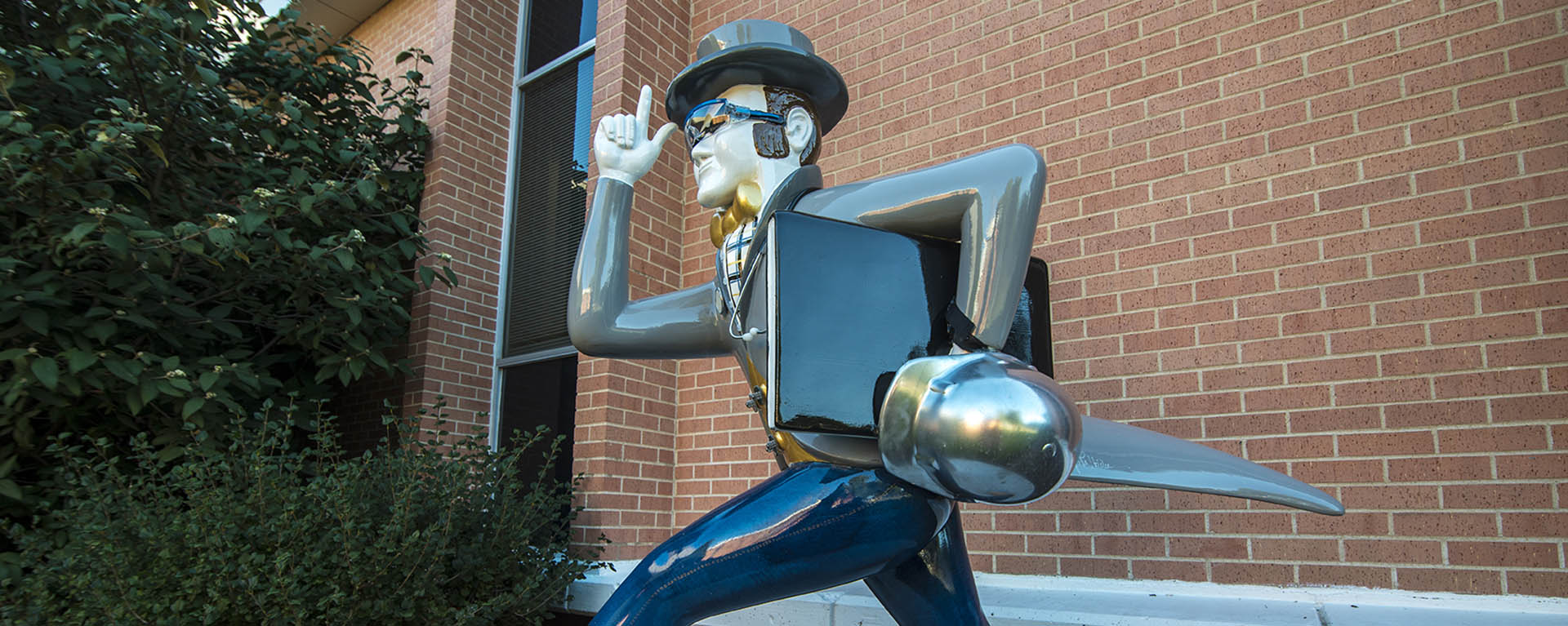 Ichabod statue in front of building