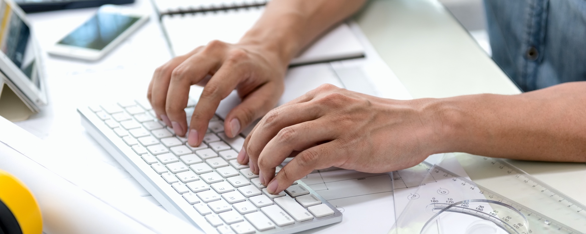 hands of a working drafter