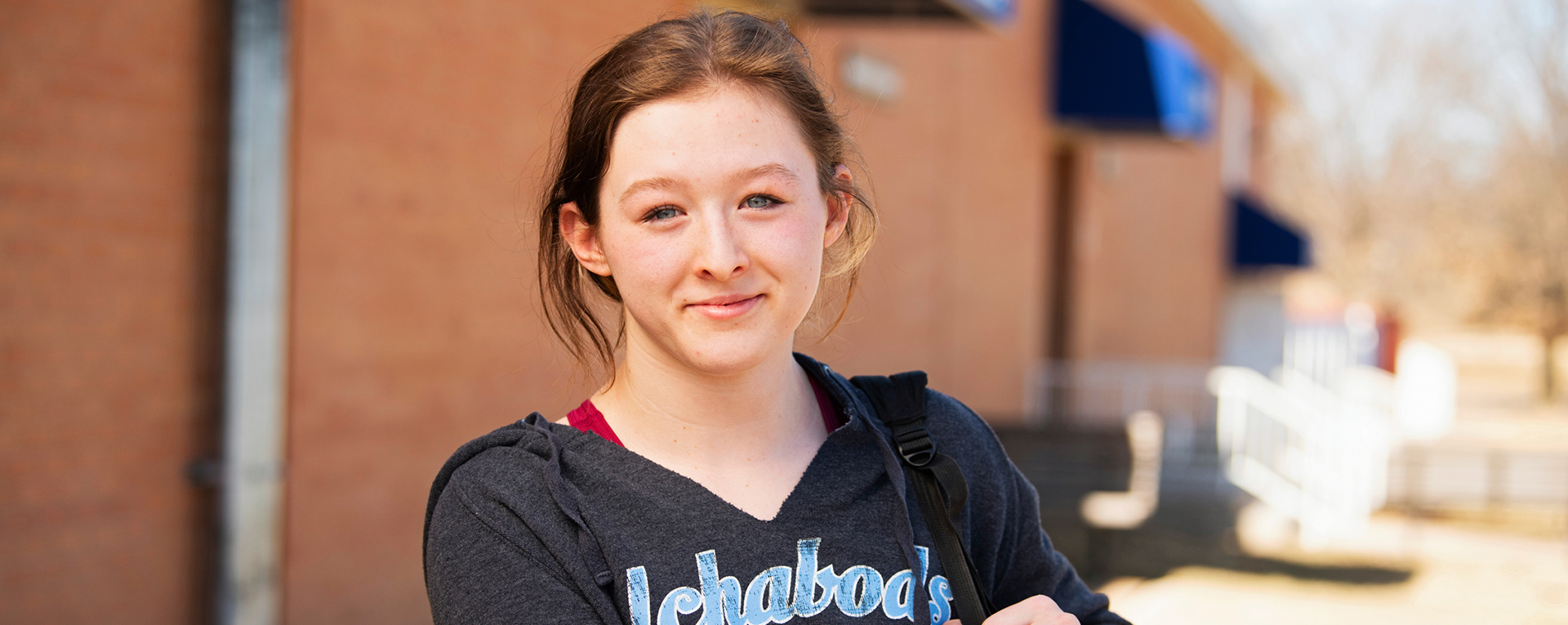 smiling student on campus