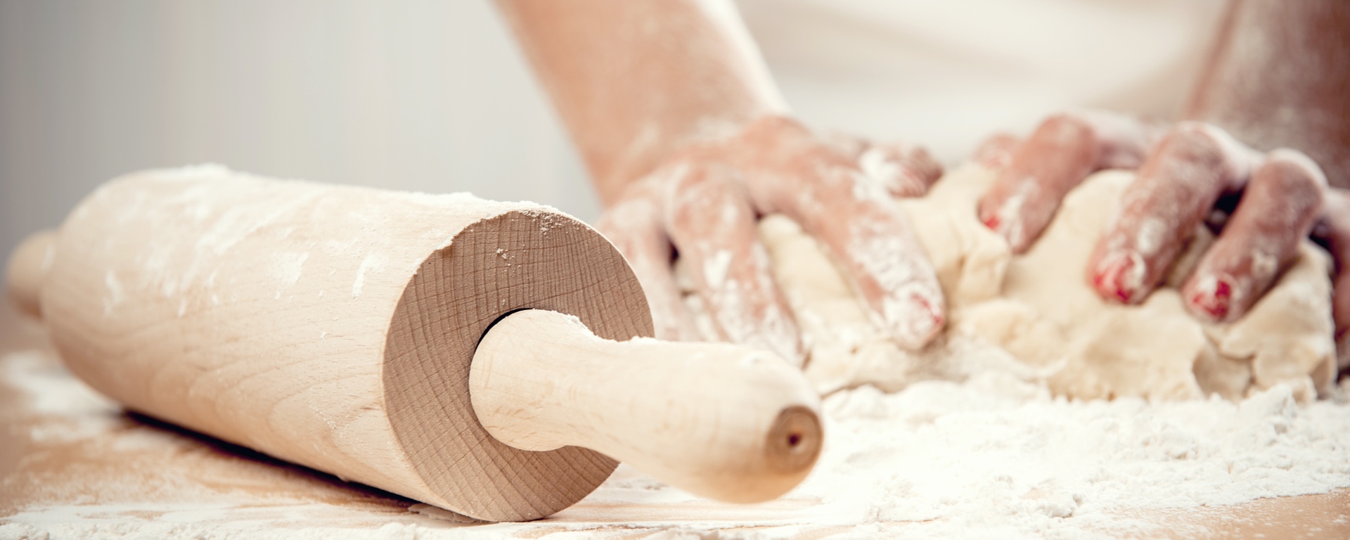 culinary student kneading bread