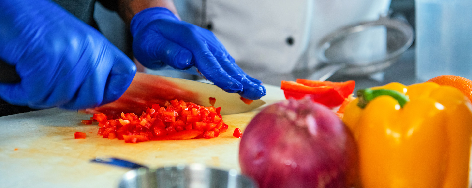 culinary student chopping vegetables