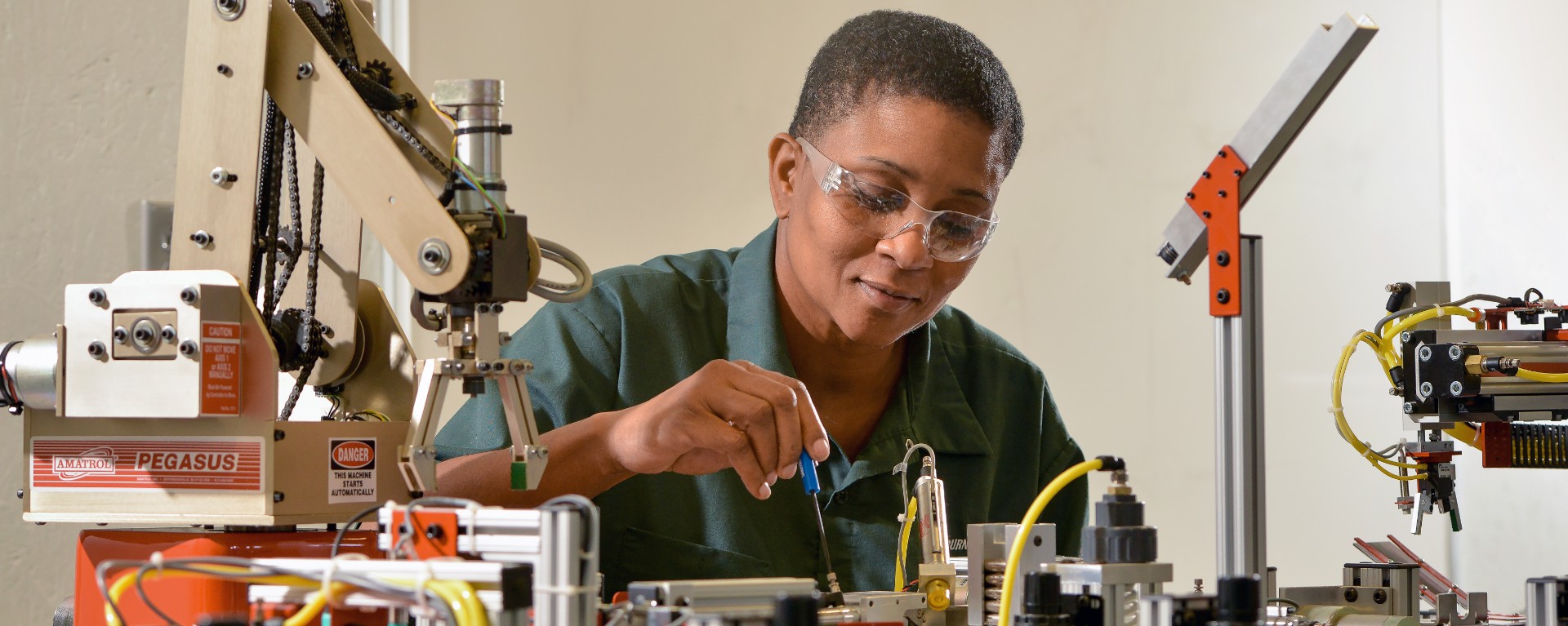 female student working on robotics