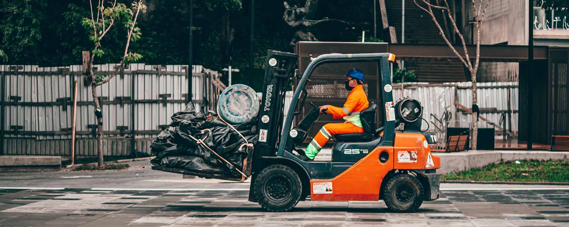 person driving a forklift