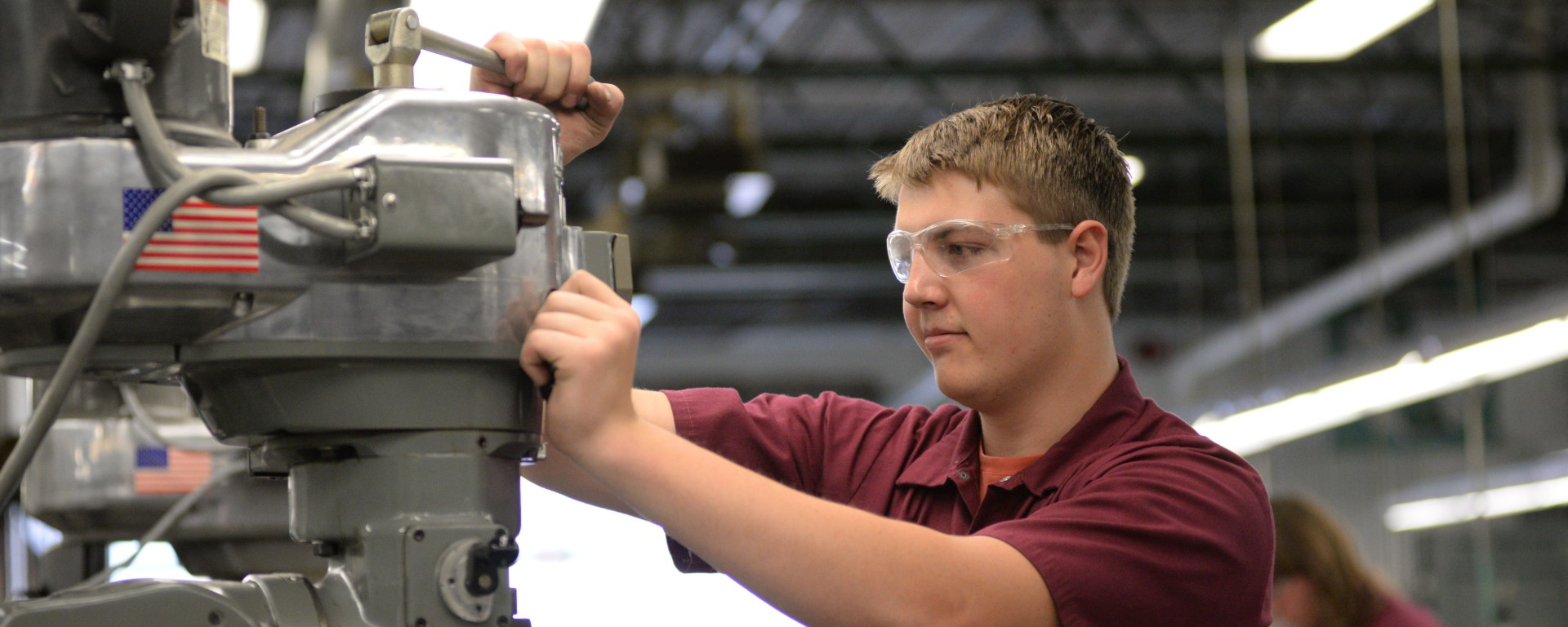 student working on equipment
