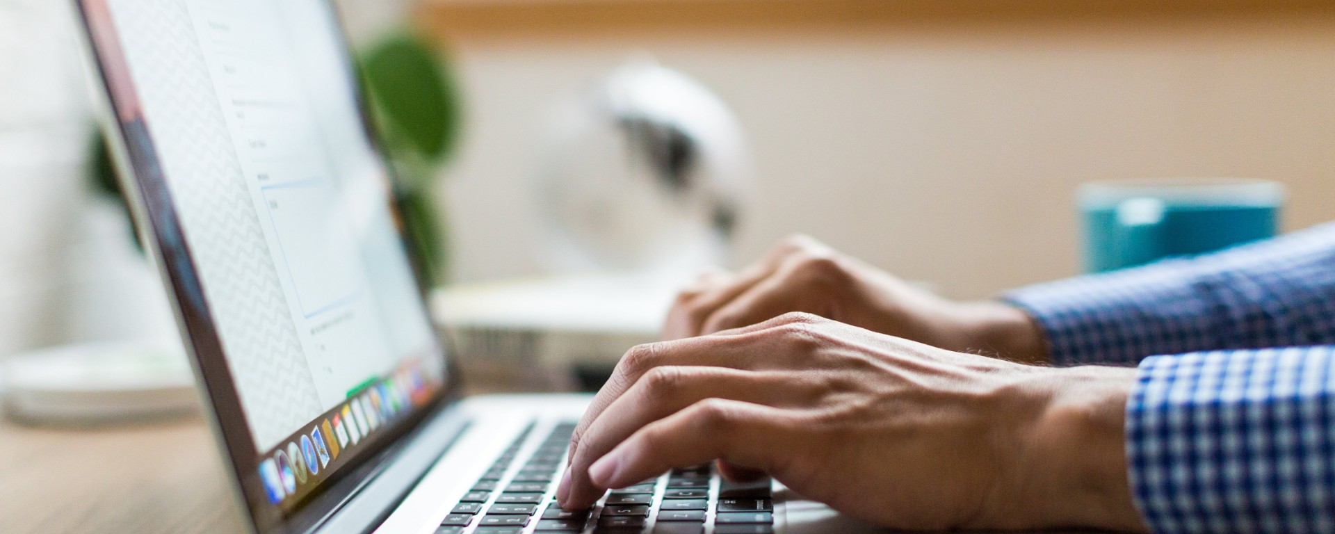 man using a laptop computer