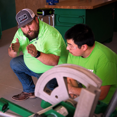 electrical instructor with student