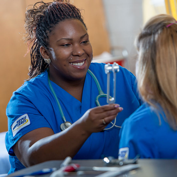 nurse caring for a patient