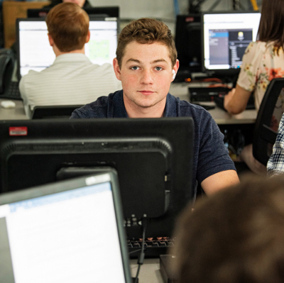 student sitting at computer