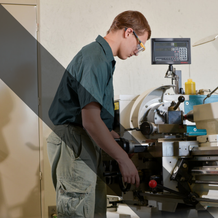 student working on machine