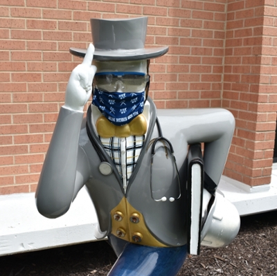 Ichabod statue wearing a mask