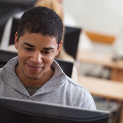 male student at computer