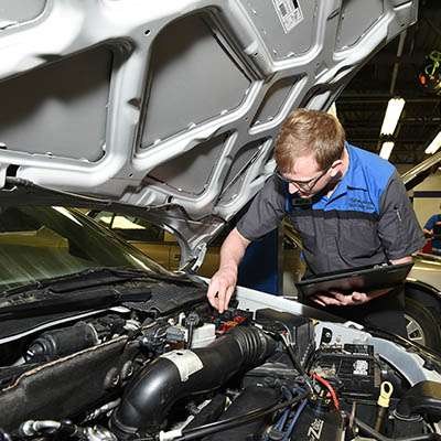 image of auto service repair technician