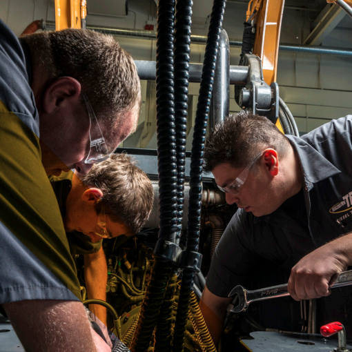 diesel mechanic students in the lab