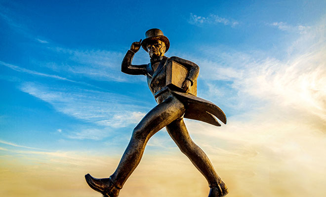 ichabod statue with sky background